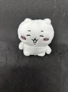 白い笑顔のぬいぐるみ