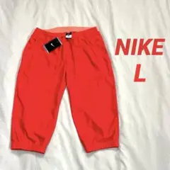 【タグ付き未使用】 NIKE 七分丈パンツ L レディース 明るめレッド
