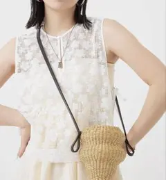 【新品・未使用】TORRAZZO DONNA スパングルサイドリボンベスト
