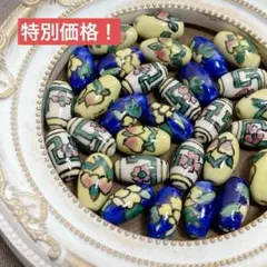 cr260/SALE！陶器ビーズ◇可愛いお花柄　なつめ形　30個