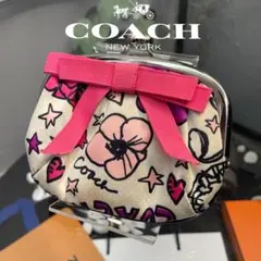 COACH花柄がま口ポーチ　ピンクリボン付き