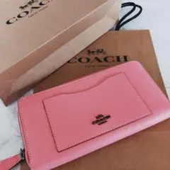 新品 US直営買付 コーチ 長財布 ポップでキュートなピンク 傷がつきにくい素材