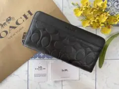 【新品未使用】ブラック長財布 コーチ シグネチャー エンボス ボコボコ 凹凸