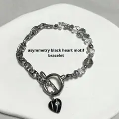 602.asymmetry black heart motif bracelet