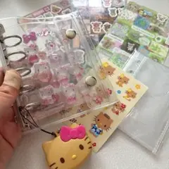 キティ　サンリオ　日焼けキティ　クリアシール帳　透明　シール帳　ストラップ　dw