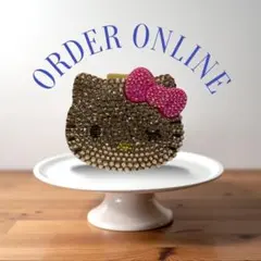 サンリオ kitty 日焼けキティつけまつげケース