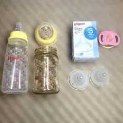 Pigeon 哺乳瓶2本と乳首3個、おしゃぶりセット クリア/イエロー
