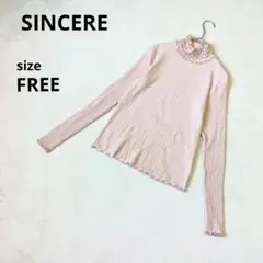 シンシア　フリルハイネックニットFREE　長袖　ピンク系　中国製