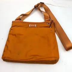 TUMI トゥミ ショルダーバッグ オレンジ レディース メンズ ブランド