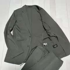 美品　希少カラー　アオキ　AOKI パジャマスーツ　カーキ　サイズS ストレッチ