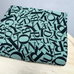 【特価】オックス生地★英字アルファベット柄グリーン×ブラック 50cm
