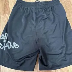 Champion ブラック ショートパンツ One Ball One Love