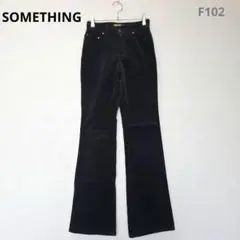 フレアパンツ　コーデュロイ　スタイルアップ　脚長　S～M相当　黒　カジュアル