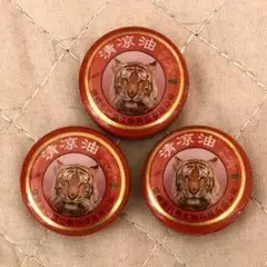 虎デザインの丸型缶