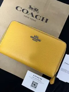 COACH コーチ ミディアムウォレット 長財布黄色 ターメリック