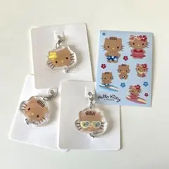 サンリオ　ダイソー　キティ　日焼けキティ　アクリルチャーム　シール　ダニエル
