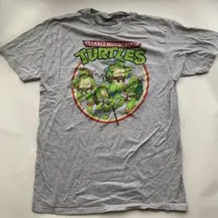 ミュータントタートルズ Tシャツ 忍者タートルズキャラクター グレー L
