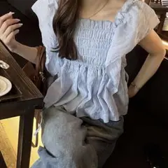 nelliy フリルシャーリングシアーブラウス