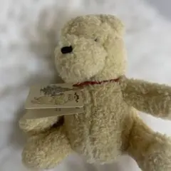 プーさん　ぬいぐるみ 赤いリボン付き