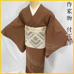 502mh27〇作家物 付下げ 茶色 木目 風 抽象柄 シンプルめ〇美品