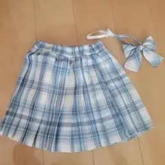 お値下げ★新品未使用品☆水色チェック プリーツスカート リボン付き　130センチ