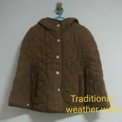 Traditional weather wear フード付きキルティングケープ