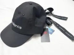new balance 黒キャップ リボン付き