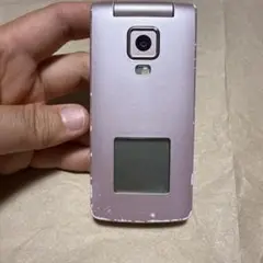 【お値下げ中‼️】難ありジャンク品　auピンク 折りたたみ式携帯電話 本体K003