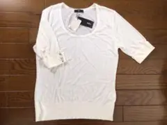 イネドのオフホワイトのセーター