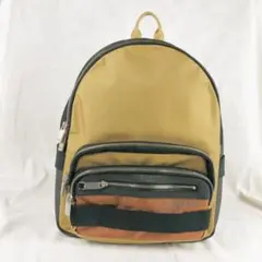 美品 ラコステ エル オン ザ ゴー マルチポケットバックパック ベージュ