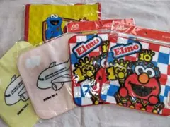 エルモ 10周年記念 タオル　USJ【匿名配送】ミニバッグ付　JAL　ミニタオル