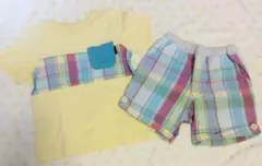 イエローTシャツとチェックショートパンツセット