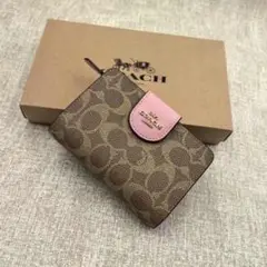 新品・未使用Coach 二つ折り財布 ブラウン/ピンクコーチ