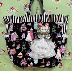 コヤンイサムチョン　ラウンド型サイドポケット付トートバッグ　オッドアイ