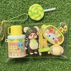 ガチャ詰めポーチ　モンチッチ　タヌタヌ　黄色
