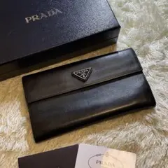 PRADA プラダ 長財布 折り財布 ロゴ金具 サフィアーノレザー ブラック