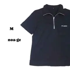 ノアジエ　ハーフジップアップ半袖トップス　胸ポケットに装飾付　黒 　M