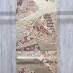 伊豆蔵賢三謹製 吉祥文様の織られた袋帯 六通