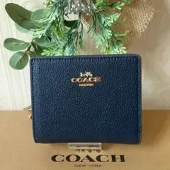 最新作新品 コーチ 二つ折り財布【ネイビー】コンパクト
