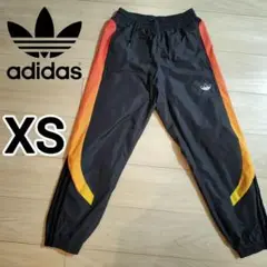アディダス SPRT SPRAY ジョガーパンツ XS オレンジ ジャージ 男性
