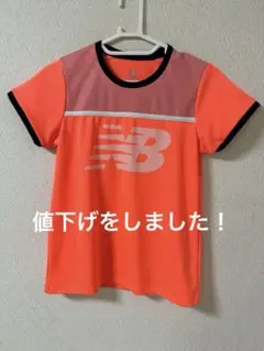 New Balance オレンジ Tシャツ