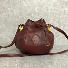 極上 美品 カルティエ マストライン 巾着 レザー ショルダーバッグ ボルドー