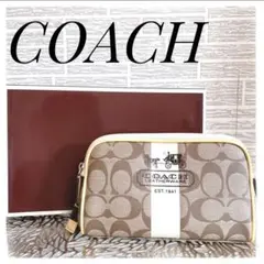 【美品】コーチ ポーチ PVC シグネチャー イエロー系 コスメポーチ
