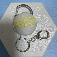ハンドメイド　リールキーホルダー　ミナペルホネン　choucho イエロー