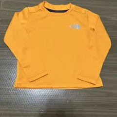 THE NORTH FACE オレンジ寄りの黄色 長袖ラッシュガード