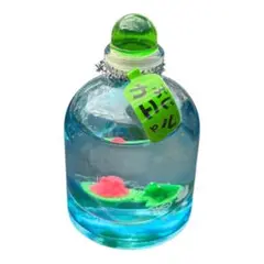 ピンクのカエル　ミニチュアボトル　ぷかぷかオイルマスコット　蓮の葉に座るカエル