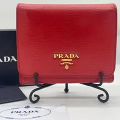 大人気❁PRADA 折り財布 赤 ラッカ ロゴ ゴールド金具
