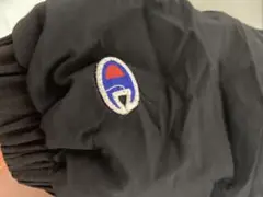 Champion ブラック ナイロンジャケット フード付き