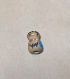 耳かきの上についてるこけし