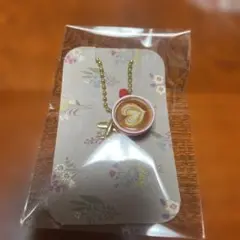 コーヒーカップチャーム と飛行機のストラップ